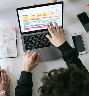 pexels-ivan-s-7213549_300px Person in Black Long Sleeve Shirt Using Macbook Pro
