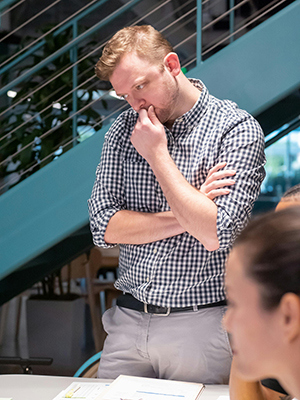 pexels-kindelmedia-7688462_300px Man Holding His Lips Thinking